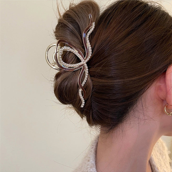 Griffe de cheveux de designer en métal doré avec perles scintillantes