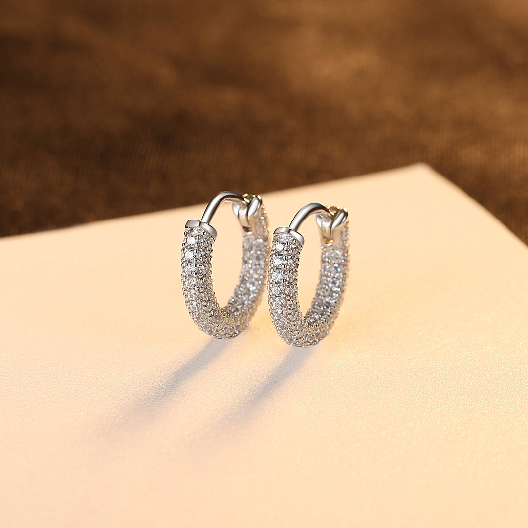 Boucles d'oreilles Huggie en argent sterling 925 plaqué or 18 carats avec zircon cubique