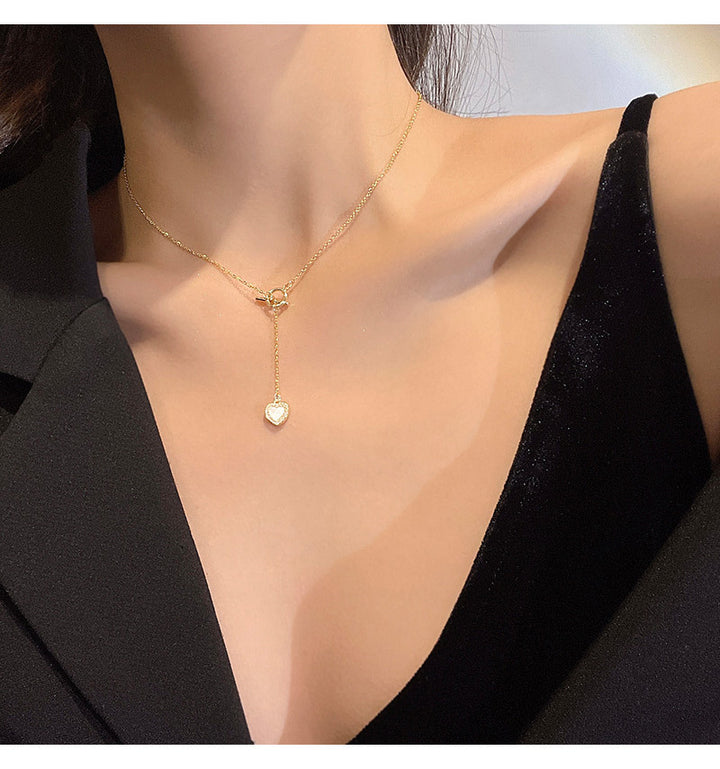 Collier en acier au titane en forme de coeur en acier inoxydable