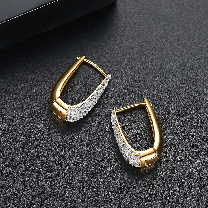 Boucles d'oreilles Huggie double plaqué or rhodium et or véritable