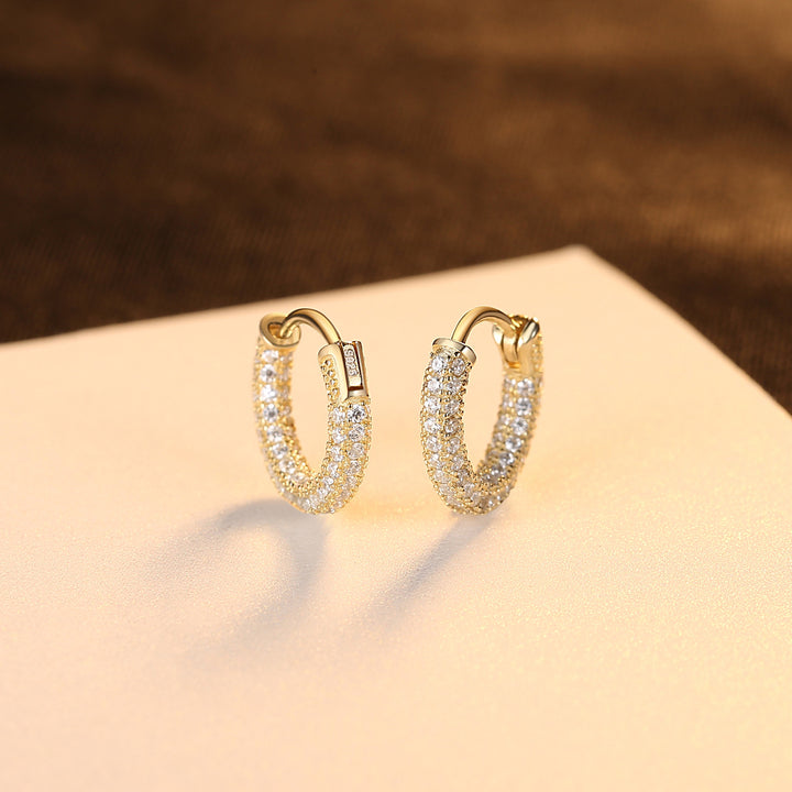 Boucles d'oreilles Huggie en argent sterling 925 plaqué or 18 carats avec zircon cubique